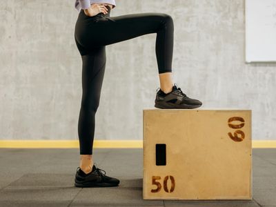 Detail of person legs during a rhythmic step exercise